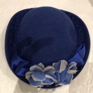 Beautiful blue hat design with flowers and netting